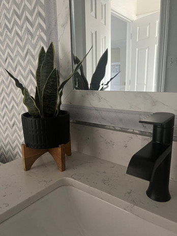 Black faucet installation, bathroom redesign, general contractor Houston