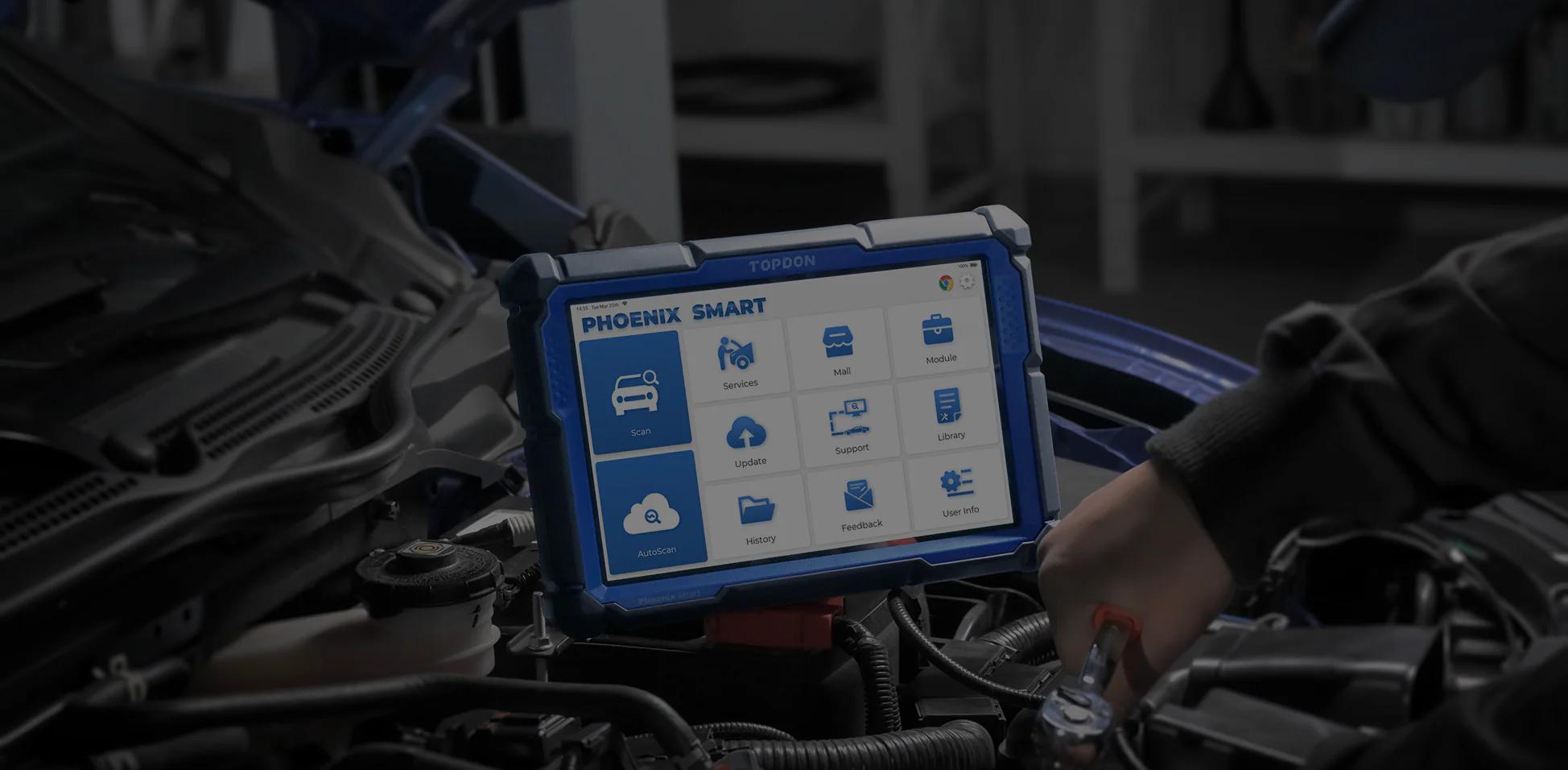 Phoenix Smart on an engine with a mechanic