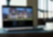 laptop showing house with lights on