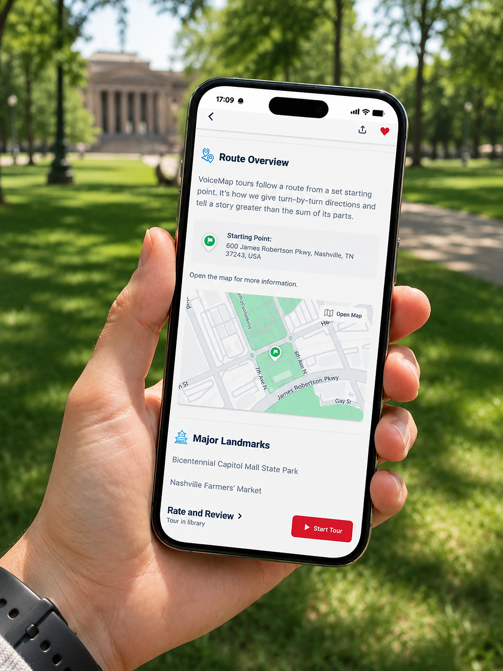 Smartphone displaying the VoiceMap app during a self-guided walking tour in a public park.