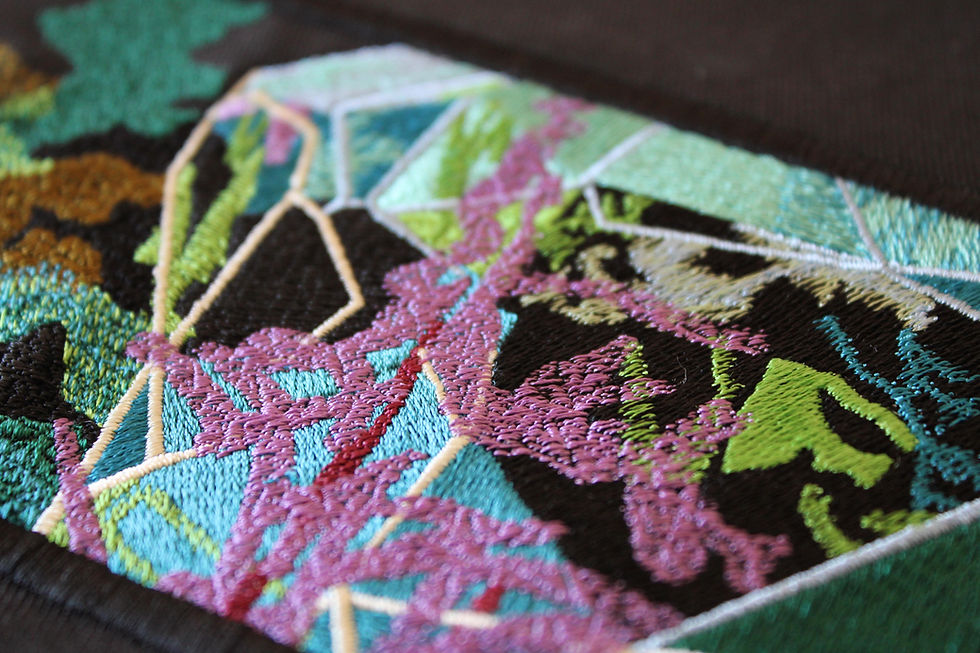 Detailed embroidery combining specialist stitch and colour techniques