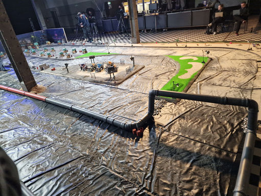 Miniature racetrack with houses and golf course