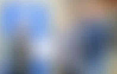 Pam Ayres with headteacher Taryn Hancock and chair of governors Michael St Aldwyn