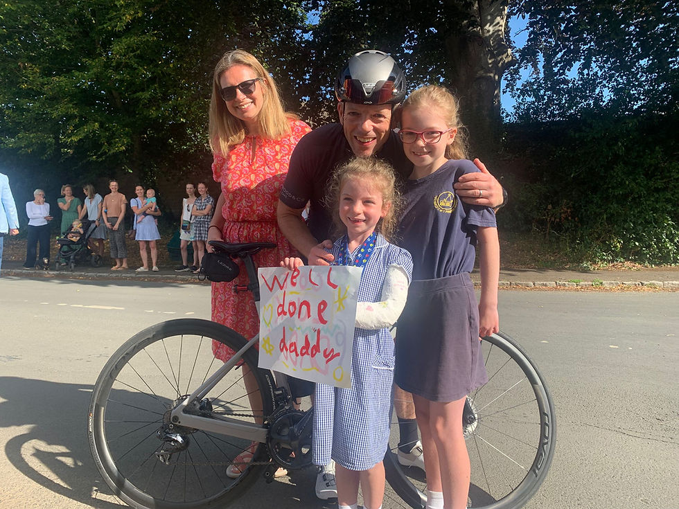 Michael with his family at the end of the gruelling challenge