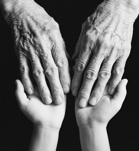 Old hands cradling the younger ones_edited.jpg