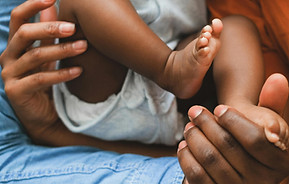 african american couple and their baby
