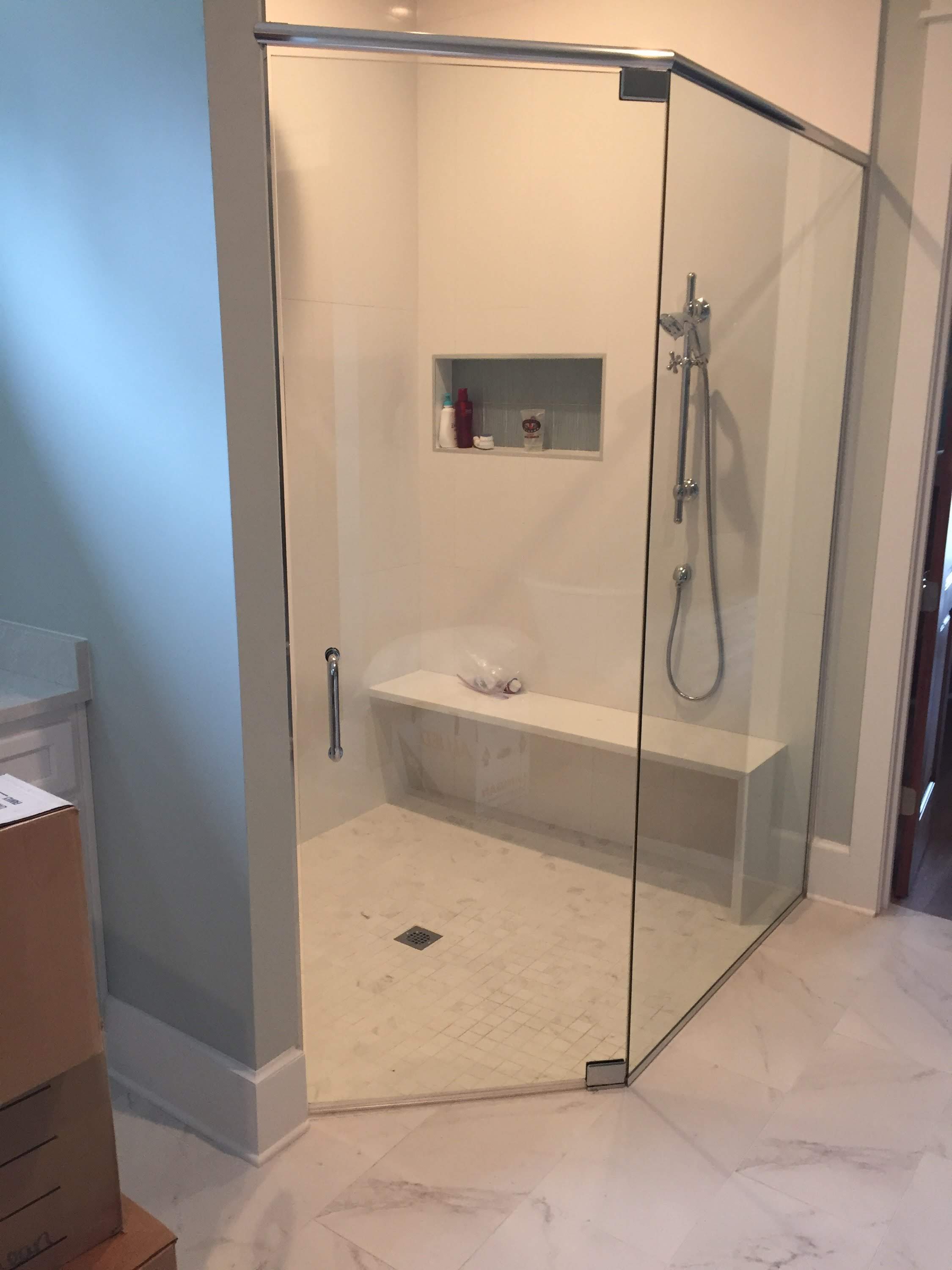 Heavy glass panel with header
