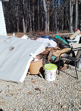 a pile of junk outside  the customers home