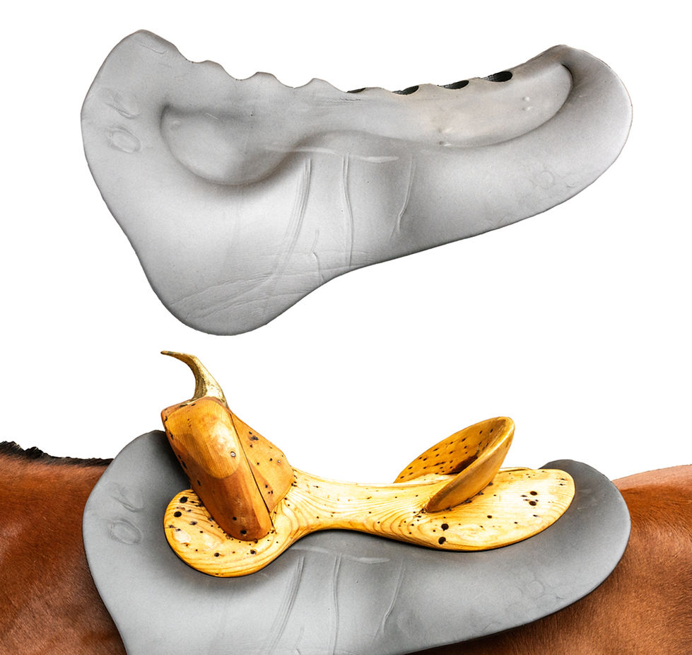 A molded North Fit pad shown alone and under a saddle