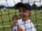 A child smiles at the camera 