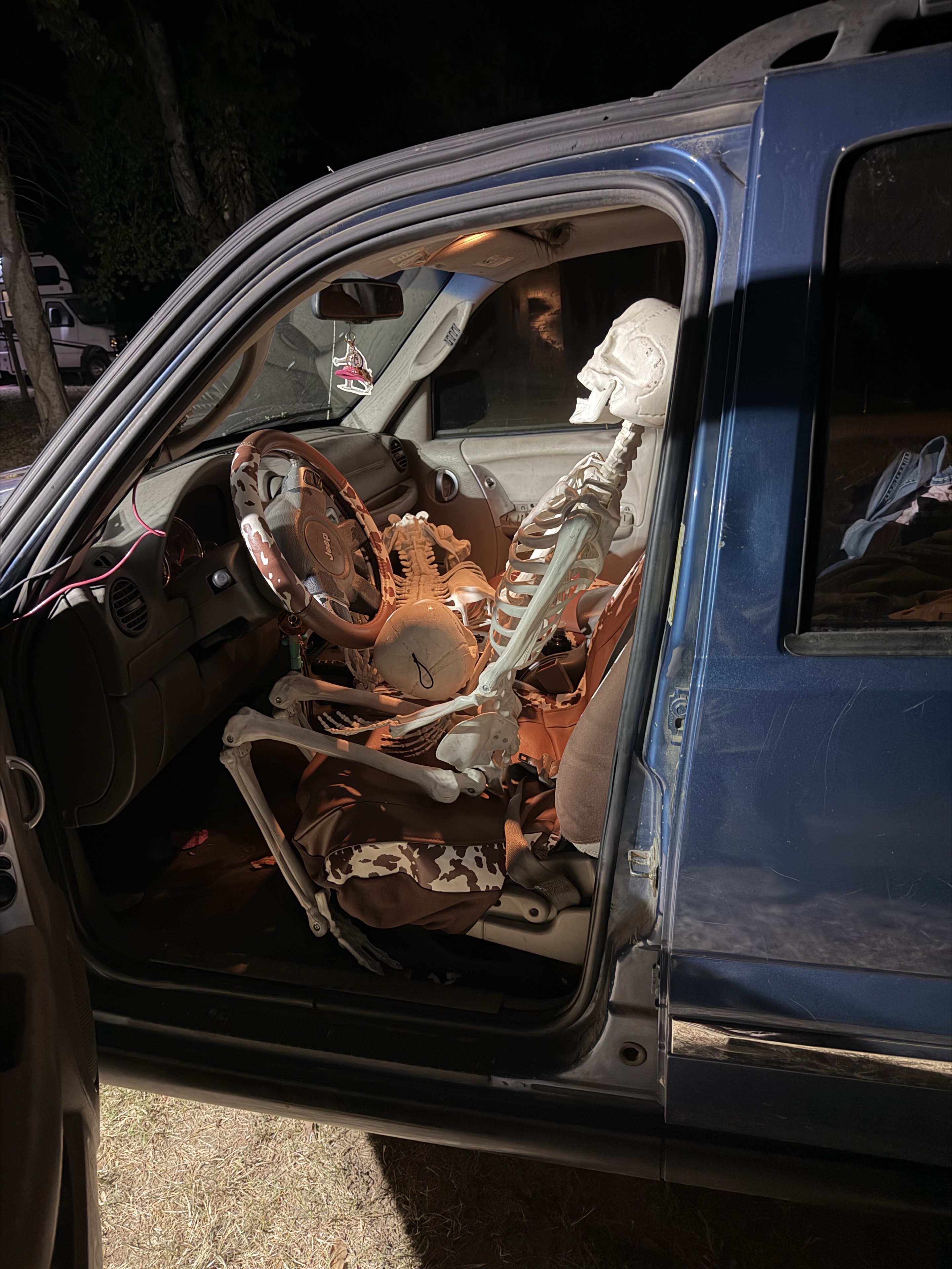 A skeleton seated behind the wheel of Cheyenne’s Jeep.