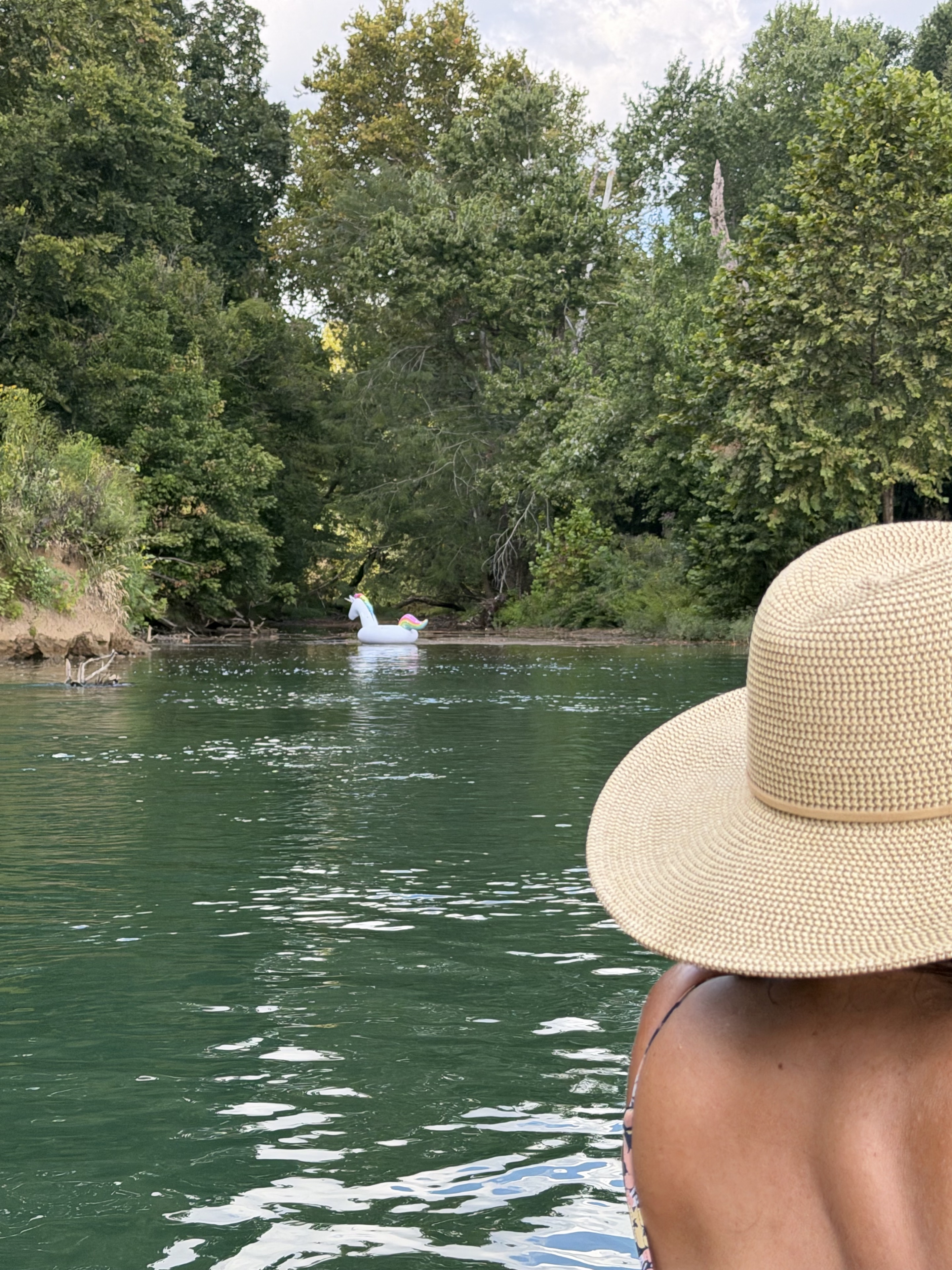 Dolly the inflatable unicorn drifting ahead on the Current River.
