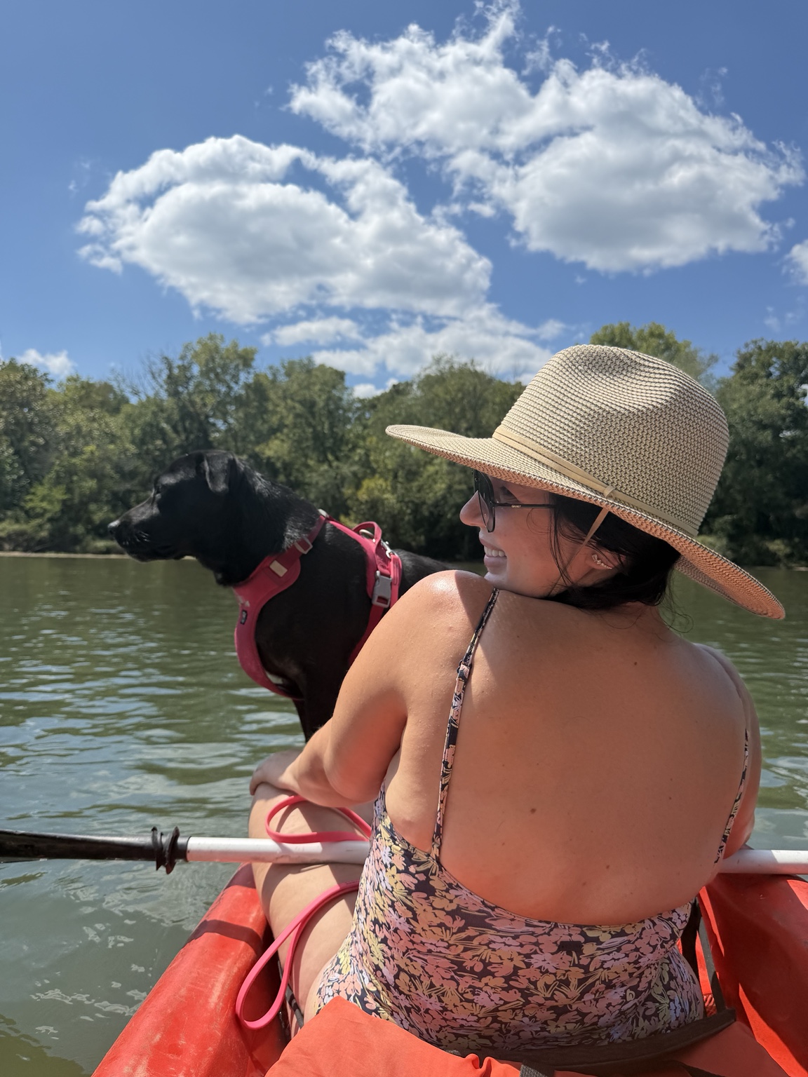 A paddler and a dachshund on the Current River.