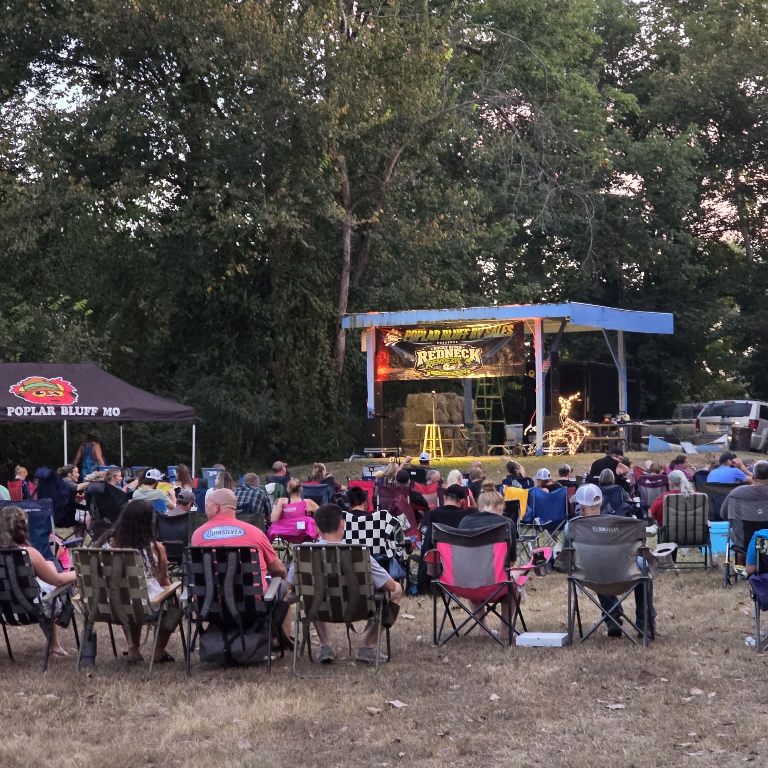 Then Saturday finally showed up: lawn chairs, an outdoor stage, and more than 350 people at Rocky River.