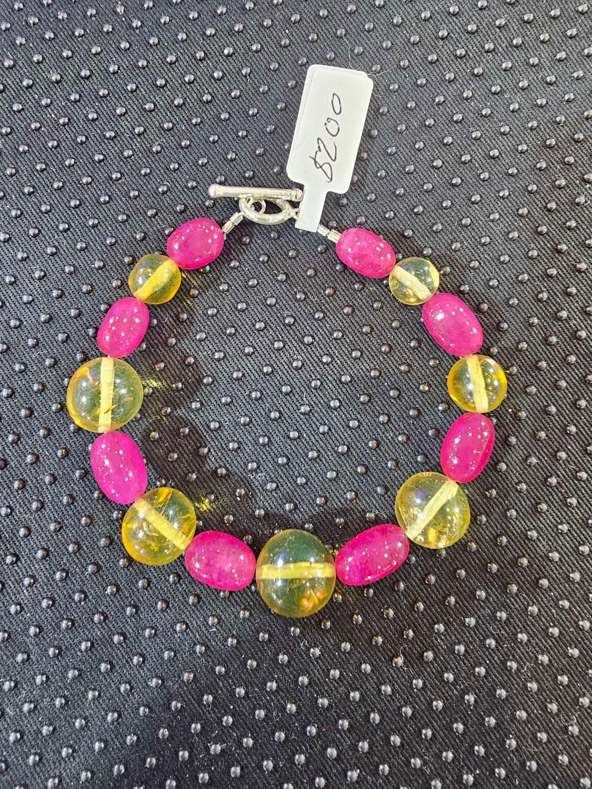 Bracelet (amber and ruby) zise 8.5" long for 2.5circle diameter)