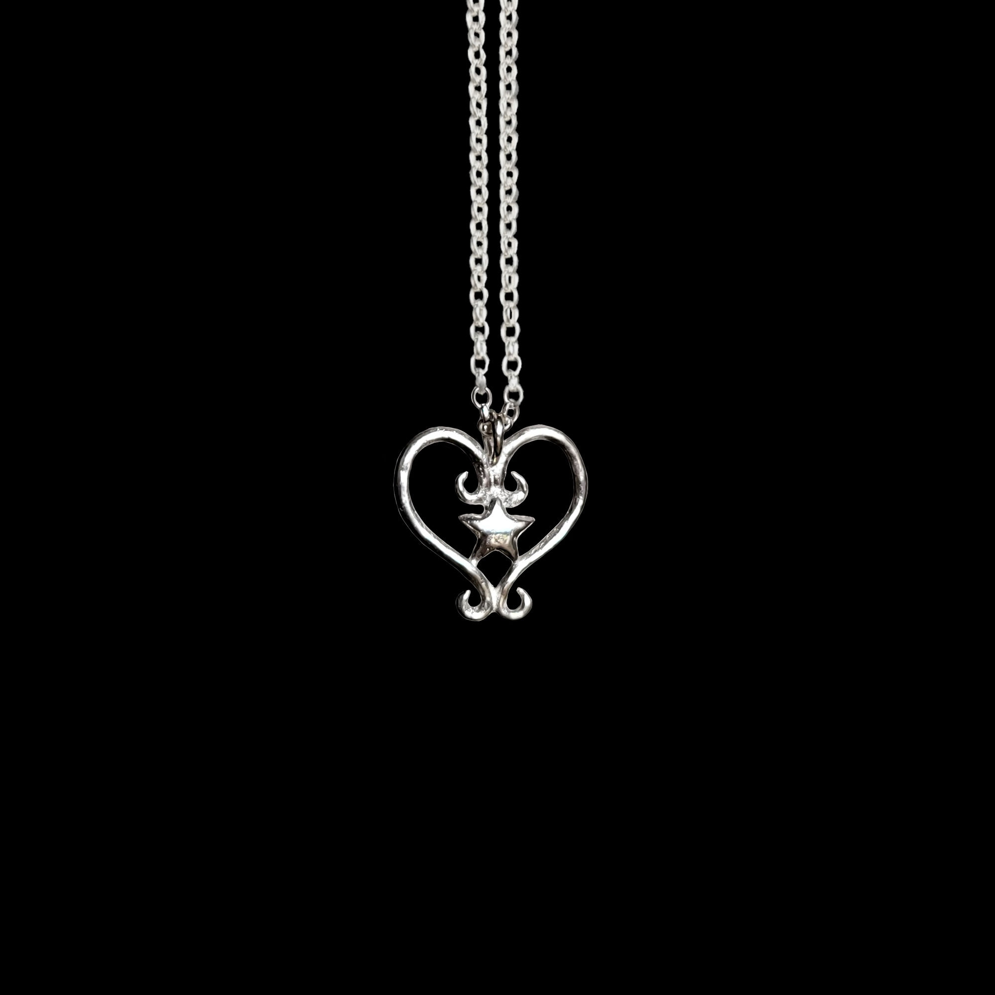 Sterling silver heart shaped pendant with star on a chain cute coquette whimsical love fairycore goth gothic necklace