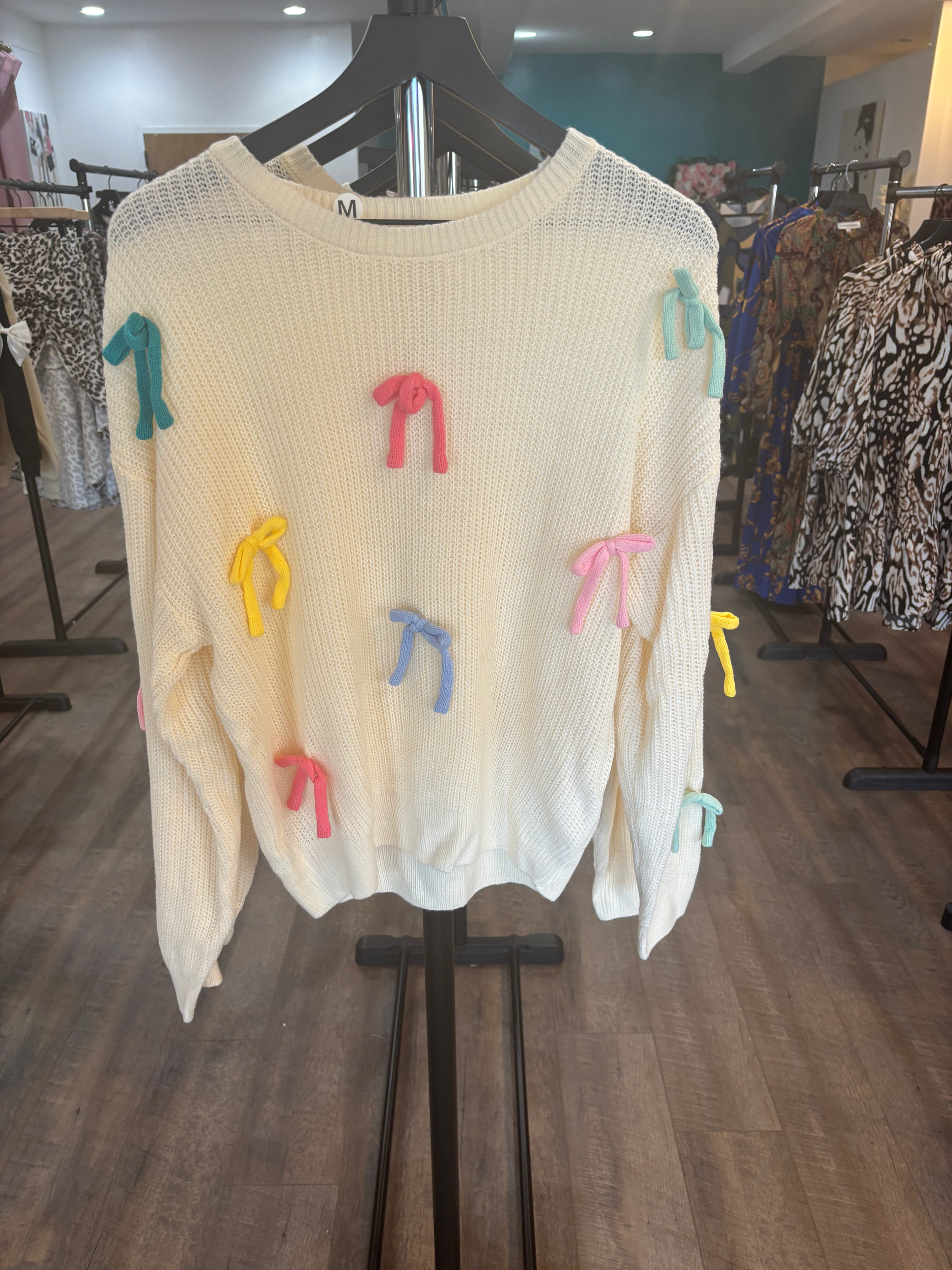 The colorful bow sweater