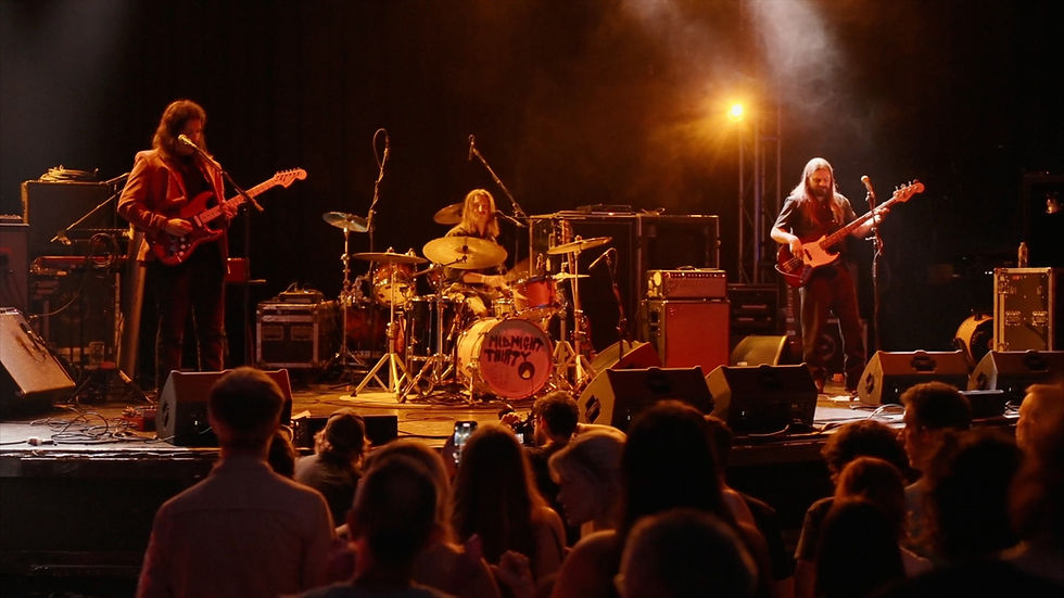Dallas videographer using a gimbal to capture dynamic live performance footage at Granada Theater.