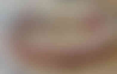 צמיד יוניסקס עשוי שרשרת דיסקית כסף 925 ארוגה בחוטי שעווה