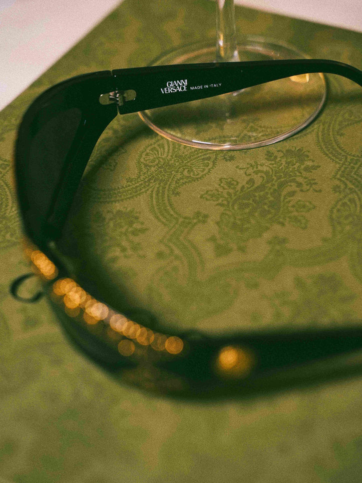 A pair of pre-owned Versace sunglasses