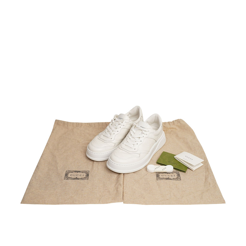 Thumbnail: Front view of a pair of luxury preowned Gucci GG Leather Embossed Sneakers in White