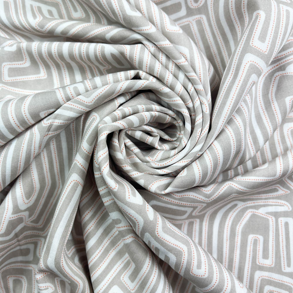 Viskosestoff mit geometrischem Muster in Taupe und Creme