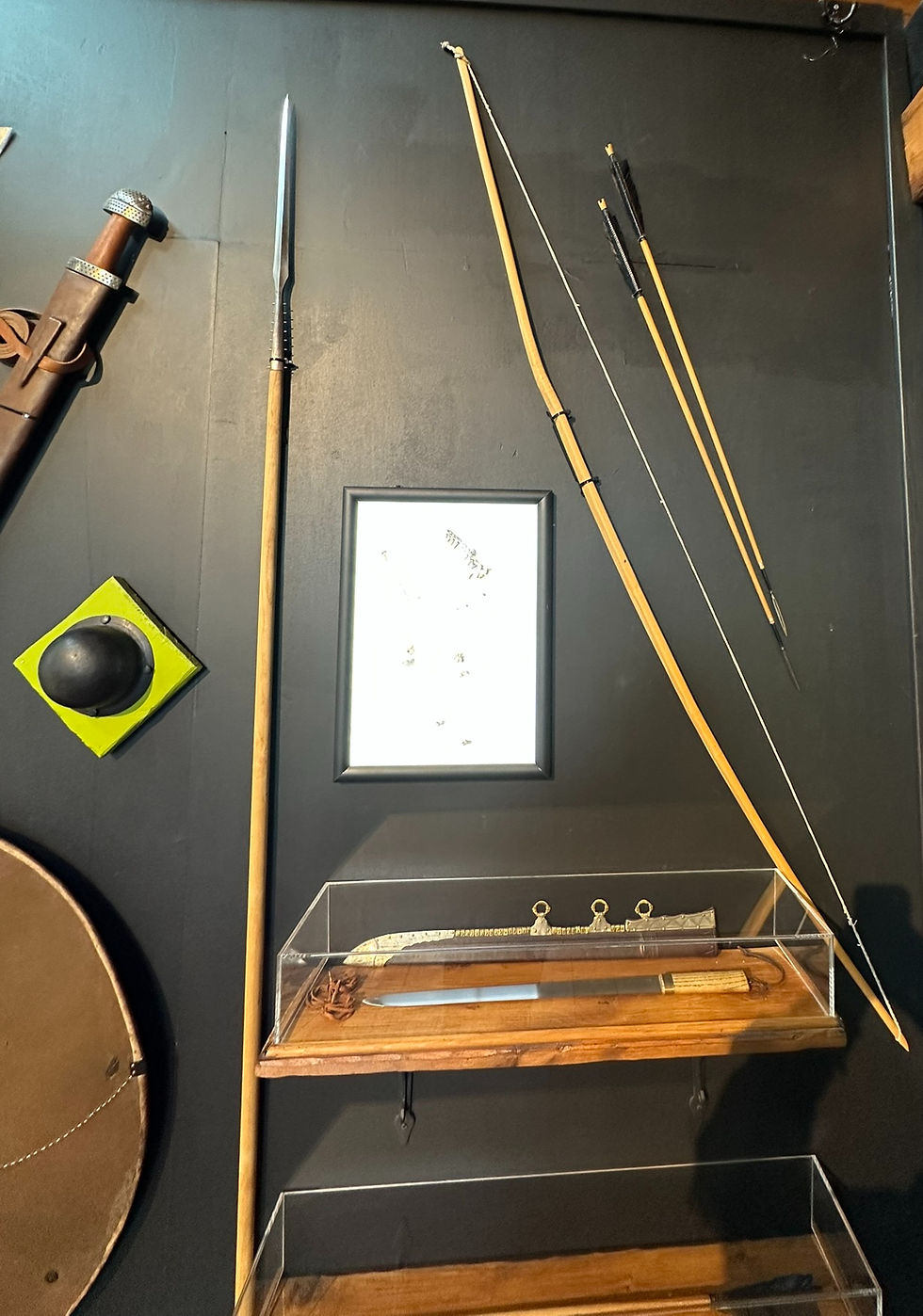 Bow and arrow, spear and weapons reproduced based on grave goods