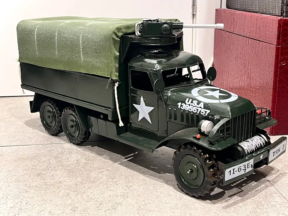 Thumbnail: Green vintage military truck toy with canvas cover