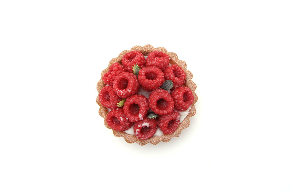 Thumbnail: Fotiqa Fake appetizing raspberry tartlets with icing sugar