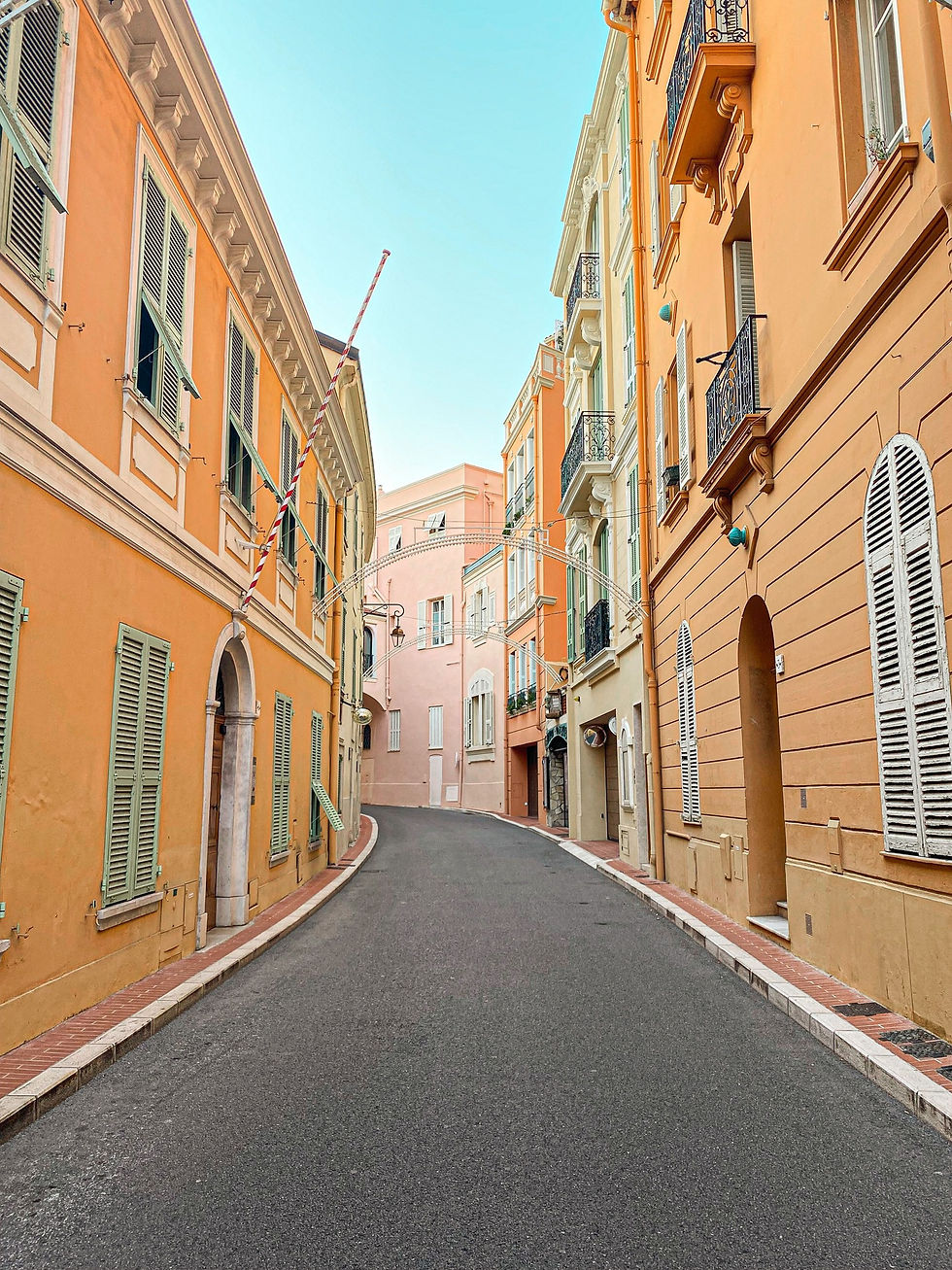 A narrow lane in Monaco-Ville, lined with the façades of the old town.