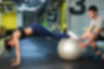 Woman on ball plank.jpeg