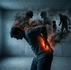 Conceptual image: A man hunched over in lower back pain. On his shoulders rests not a physical weight, but a dark storm cloud showing silhouettes of relationship conflicts and parent-child problems. The lower back glows red (inflammation/cortisol).