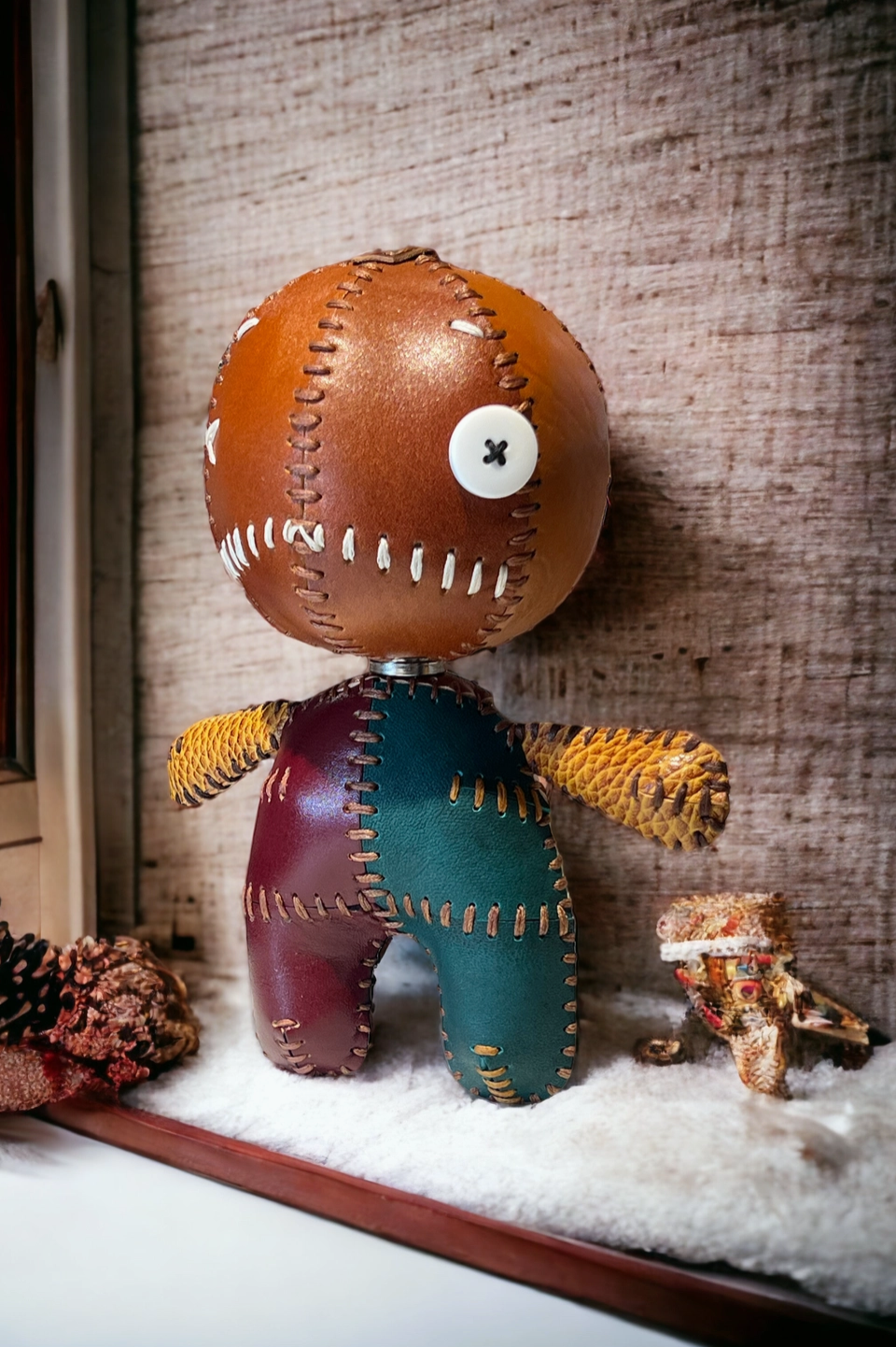 Poupée cuir véritable