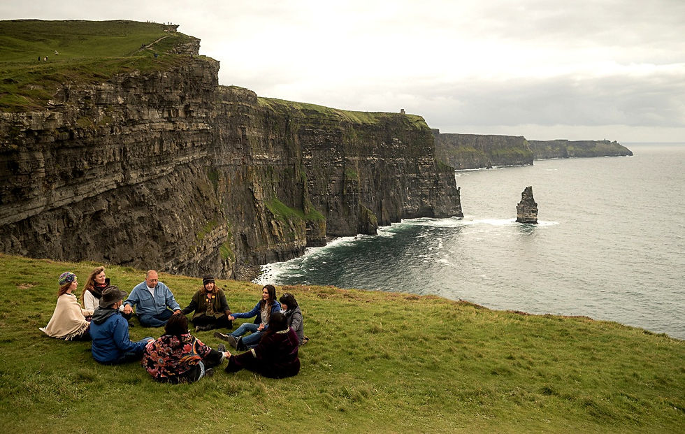 Group meditation at Cliffs of Moher Ireland