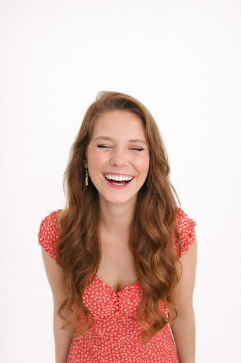 Lis in red dress laughing