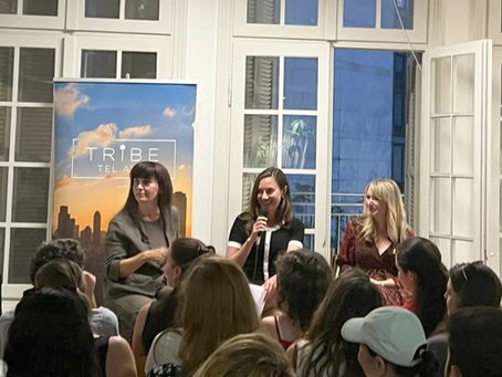 Shanna Fuld hosting Tribe Tel Aviv Sunset Series panel featuring Dr. Einat Wilf and journalist Yardena Schwartz.