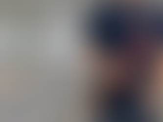 A plumber in a navy blue Honest Abe Plumbing uniform stands in a modern, well-lit bathroom holding a red pipe wrench. The background features white cabinetry, a freestanding tub, and a South Carolina palmetto and crescent moon emblem on the wall. Text on the image reads: "How to Choose the Best Plumber in South Carolina."