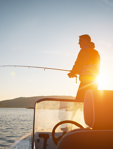 man-boat-fishing-sunset_edited.jpg