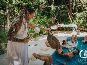 A serene sound healing session unfolds by the pool at Lunita Jungle Retreat Center, where participants relax and immerse themselves in calming vibrations.