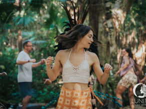 Embracing the rhythm of the jungle, a participant surrenders to the dance during a movement retreat at Lunita Jungle Retreat Center.
