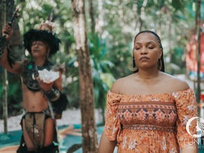 A serene moment of contemplation during a cultural ceremony at a retreat center in Mexico, surrounded by lush jungle.