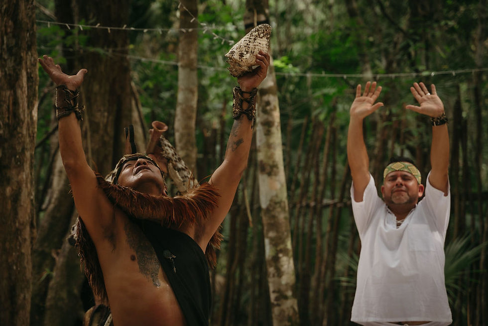 Participants engage in a spiritual ceremony at Lunita Jungle Retreat Center, surrounded by the lush greenery of Riviera Maya, Mexico.