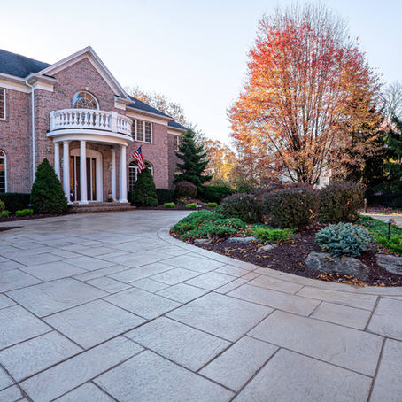 Why Choose Stamped Concrete over Pavers? A Smarter, More Stylish Outdoor Upgrade