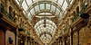 Ornate shopping arcade with vaulted glass ceiling