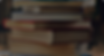 Stack of old hardcover books