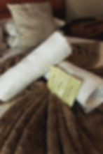 Fresh towels and guest amenities prepared on bed at Crocodilian Hotel accommodation Fochville