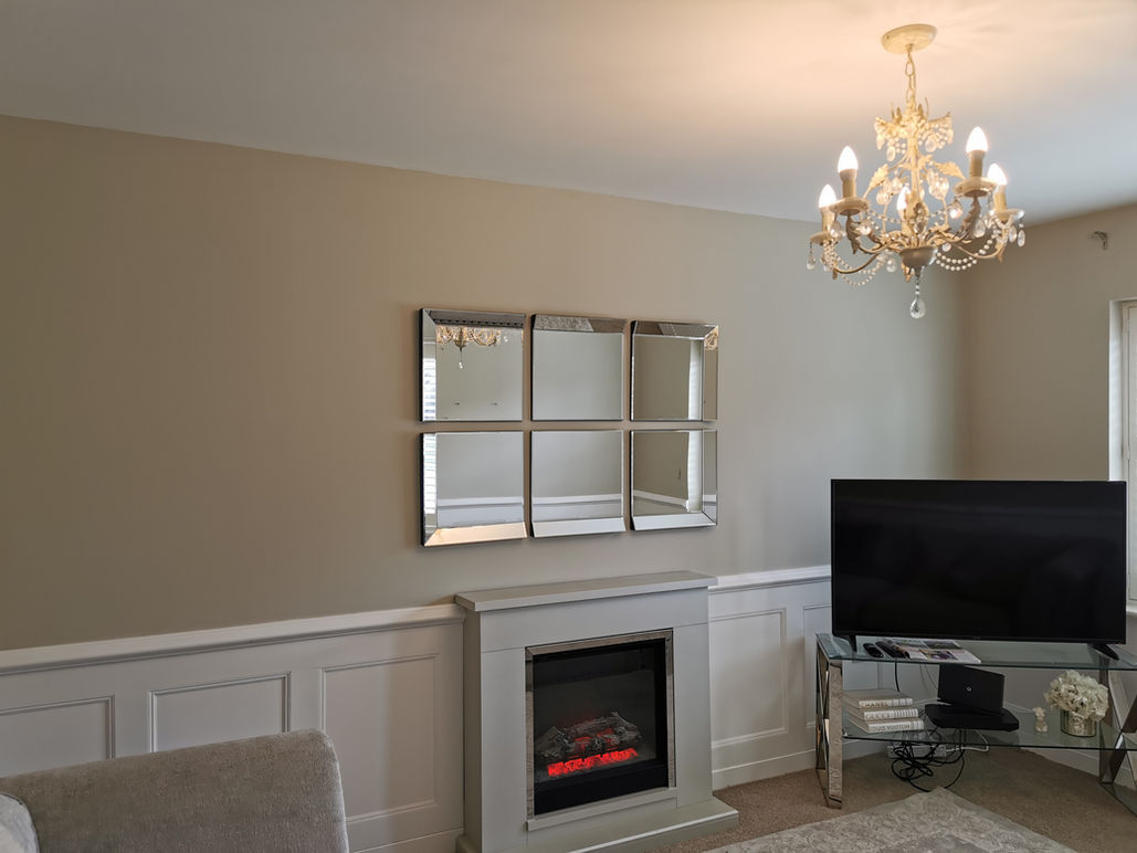 After - Mirror has been out up and all walls and woodwork has been prepared and painted