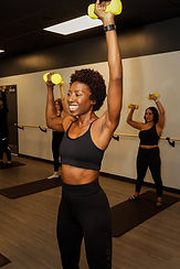 Fun and focused strength training during a rejuvenating Fit Body class at Rhythm Cycle & Sculpt in Shawnee, Kansas.
