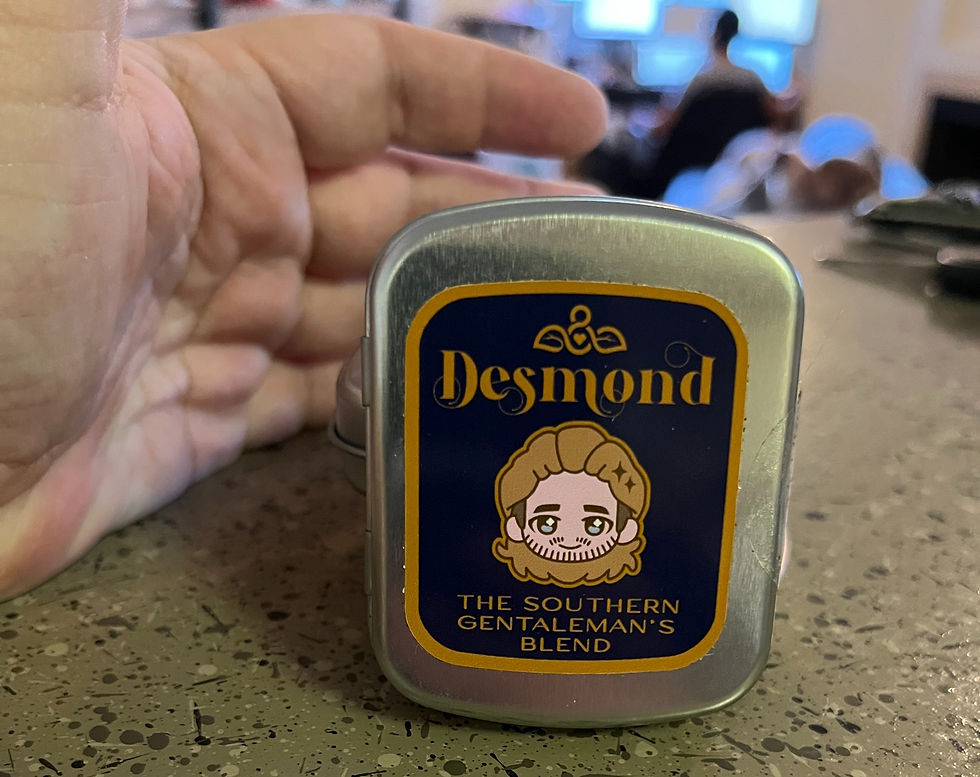 Close up of a hand holding Desmond's sample tea