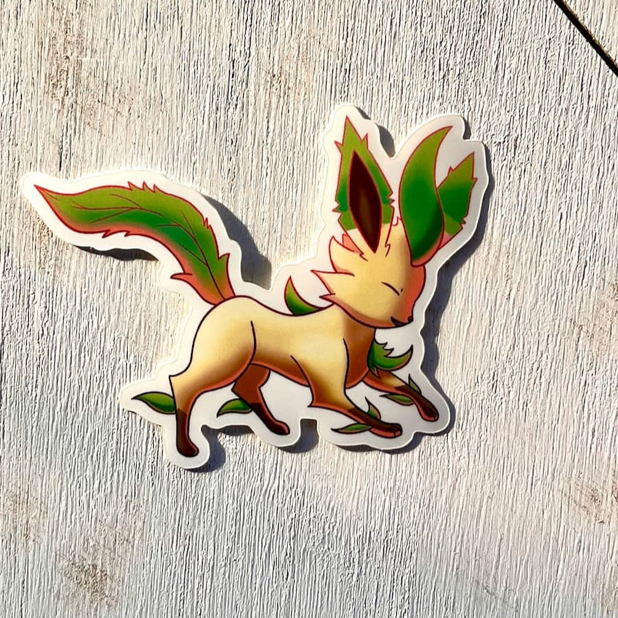 Thumbnail: Leafeon vinyl sticker on a light wood surface
